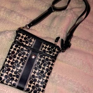 Black and white coach crossover purse